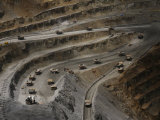 Trucks Hauling Waste Rock at Batu Hijau, a Copper and Gold Mine Photographic Print by Randy Olson