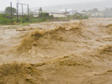 Major Flash Flood Filled with Mud and Debris after Hurricane Dean Photographic Print by Mike Theiss