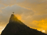 Christ the Redeemer Statue Atop Corcovado in Orange Glow at Sunset Photographic Print by Mike Theiss 
