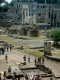 Tourists Walk Through Rome's Ancient Forum with Palatine Hill Behind Photographic Print by O. Louis Mazzatenta