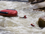 Two White Water Rafters Swim after their Raft Flips Photographie par Skip Brown