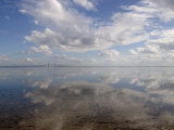 Cloud Reflections in Calm Water with the Sunshine Skyway Bridge Photographie par Skip Brown