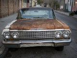 Rusty Old Car in the French Quarter of New Orleans Photographic Print by Tyrone Turner