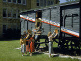 Students Mount French Escutcheons on a Special Train Car Photographie par Jack Fletcher