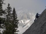 Rock Climber Scales a Face Below Cascade Mountain in Canada's Banff National Park Photographic Print by Gordon Wiltsie