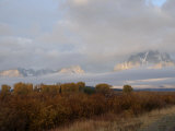 Clouds Cover Mt. Moran in Grand Teton National Park Photographie par Jodi Cobb