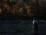 Fisherman Fly Fishing for Atlantic Salmon, Salmo Salar Photographie par Paul Nicklen