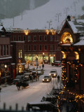 Carriage and Slded on Snowy Steets in Aspen. Ski Lift in the Distance Photographie par Paul Chesley