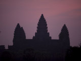 Silhouetted Temples at Sunrise in Angkor Wat Photographic Print by Rebecca Hale