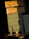 Late Afternoon Sunlight on Farm Equipment with Deep Shadows Photographic Print by Stephen Sharnoff