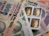 Indian Rupees and Stamps Photographic Print by Abraham Nowitz