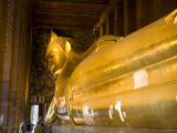 Gilded Reclining Buddha Statue at the Wat Po Temple, Bangkok Photographic Print by Rebecca Hale