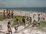 Sunbathers and Beach Umbrellas Dot the Shore Along the Atlantic Photographic Print by Willard Culver