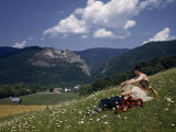 Men in Flower-Carpeted Hillside Meadow Look Toward Seneca Rocks Photographie par Walter Meayers Edwards