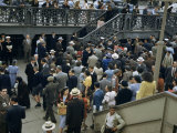 Commuters Crowd a Ferry Landing During Rush Hour Photographic Print by Maynard Owen Williams