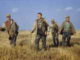 Trappers Walk Home with a Successful Day's Catch of Muskrats Photographic Print by Robert Sisson