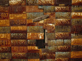 Side of a Building Adorned with Old License Plates Photographic Print by Raymond Gehman