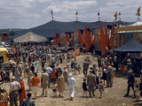 People Wander Up and Down Past Side Shows on a Circus Midway Photographie par Willard Culver