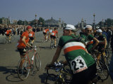 Athletes from Many Countries Await the Start of the Tour De France Lámina fotográfica por Justin Locke