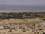 Old Jericho's Ruins Lie Between Adobe Village and Modern Town Photographie par David Boyer
