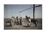 Cowboys in Sheepskin and a Horse Center around a Well in the Puszta Photographic Print by Hans Hildenbrand