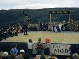 Bagpiper Plays in a Piping Competition at Highland Games Photographic Print
