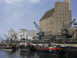 Cargo Barges from Rotterdam Line Riverside Wharf Beside Warehouses Photographic Print by Willard Culver