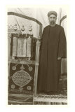 Rabbi with Torah Posters
