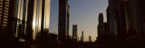 Buildings in a City, Sheikh Zayed Road, Dubai, United Arab Emirates Lámina fotográfica por Panoramic Images Buildings in a City, Sheikh Zayed Road, Dubai, United Arab Emirates Lámina fotográfica por Panoramic Images