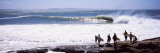 Silhouette of Surfers Standing on the Beach, Australia Photographic Print by Panoramic Images 