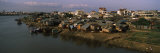 Buildings at the Waterfront, Tonle Sap, Phnom Penh, Cambodia Photographic Print by Panoramic Images 