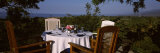 Chairs with Dining Table in a Resort, Lovina Beach, Bali, Indonesia Lámina fotográfica por Panoramic Images Chairs with Dining Table in a Resort, Lovina Beach, Bali, Indonesia Lámina fotográfica por Panoramic Images