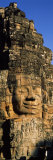 Face Carved on Rocks in a Temple, Bayon Temple, Angkor, Cambodia Photographic Print by Panoramic Images 