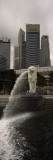 Fountain with Office Buildings in Background, Merlion Statue, Merlion Park, Singapore River Lámina fotográfica por Panoramic Images