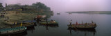 Boats in a River, Yamuna River, Vrindavan, Mathura District, Uttar Pradesh, India Lámina fotográfica por Panoramic Images