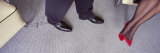 Leg of a Person Tied to a Chair with Shoe Laces and a Woman Sitting Beside Him Photographic Print by Panoramic Images 