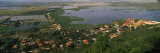 View of a Town at the Riverside, Tonle Sap, Cambodia Photographic Print by Panoramic Images 