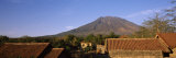 Houses with Volcanic Mountain in the Background, Mt Agung, Tulamben, Bali, Indonesia Lámina fotográfica por Panoramic Images Houses with Volcanic Mountain in the Background, Mt Agung, Tulamben, Bali, Indonesia Lámina fotográfica por Panoramic Images