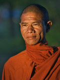 Burma, Rakhine State, A Buddhist Monk Enjoys the Late Afternoon at Sittwe, Myanmar Photographic Print by Nigel Pavitt