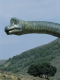 Statue of a Dinosaur at the Site of Dinosaur Footprints at La Virgen Del Campo Photographic Print by John Warburton-lee