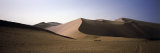 Tourists Riding Camels in a Desert, Dunhuang, Jiuquan, Gansu Province, China Photographic Print by Panoramic Images 