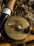 Traditional Brass Fishing Reel Fitted to a Split-Cane Fly Rod with Trout Fishing Flies, UK Photographic Print by John Warburton-lee