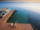 Bay Islands, Utila, Children Play on Jetty Outside Cafe Mariposa, Honduras Photographic Print by Jane Sweeney