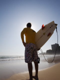 A Surfer Looks Out to the Waves at Manly Beach on Sydney's North Shore, Australia Photographic Print by Andrew Watson
