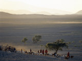 Scene at a Maasai Manyatta, or Homestead, at Dawn in an Arid Part of Northern Tanzania Photographic Print by Nigel Pavitt