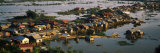 View of a Floating Village in a Lake, Tonle Sap, Cambodia Photographic Print by Panoramic Images 