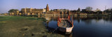 Boat Moored at the Riverside, Yamuna River, Vrindavan, Mathura District, Uttar Pradesh, India Lámina fotográfica por Panoramic Images Boat Moored at the Riverside, Yamuna River, Vrindavan, Mathura District, Uttar Pradesh, India Lámina fotográfica por Panoramic Images