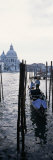 Gondolier in Gondola with Cathedral in Background, Santa Maria Della Salute, Venice, Veneto, Italy Photographie par Panoramic Images 