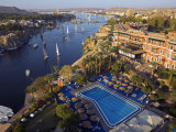 Aswan in Late Afternoon, Old Cataract Hotel in front, Where Agatha Christie Wrote Death, Nile Photographie par Julian Love