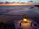 Sunset Dining on the Jetty, Fundu Lagoon Resort, Pemba Island, Zanzibar, East Africa Photographie par Paul Harris